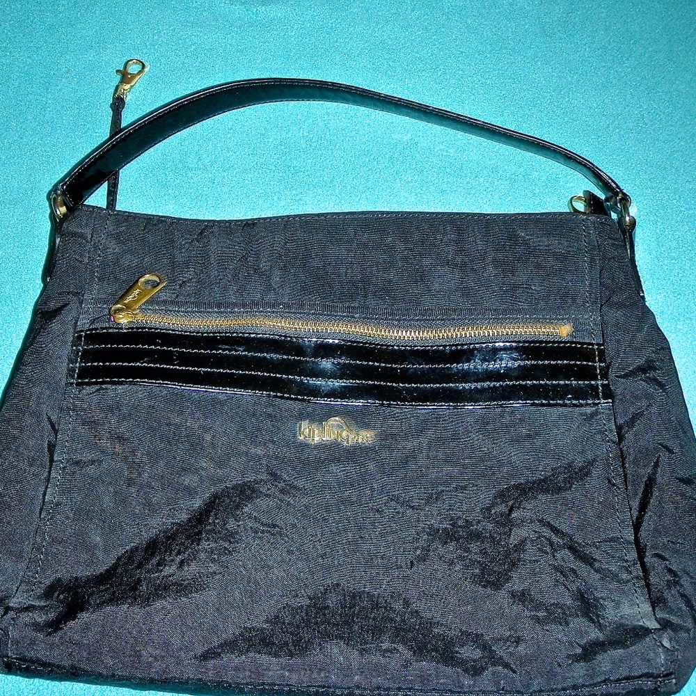 KIPLINGER WOMEN'S LARGE BLACK FABRIC BAG LINED IN PINK PATENT LEATHER HANDLE